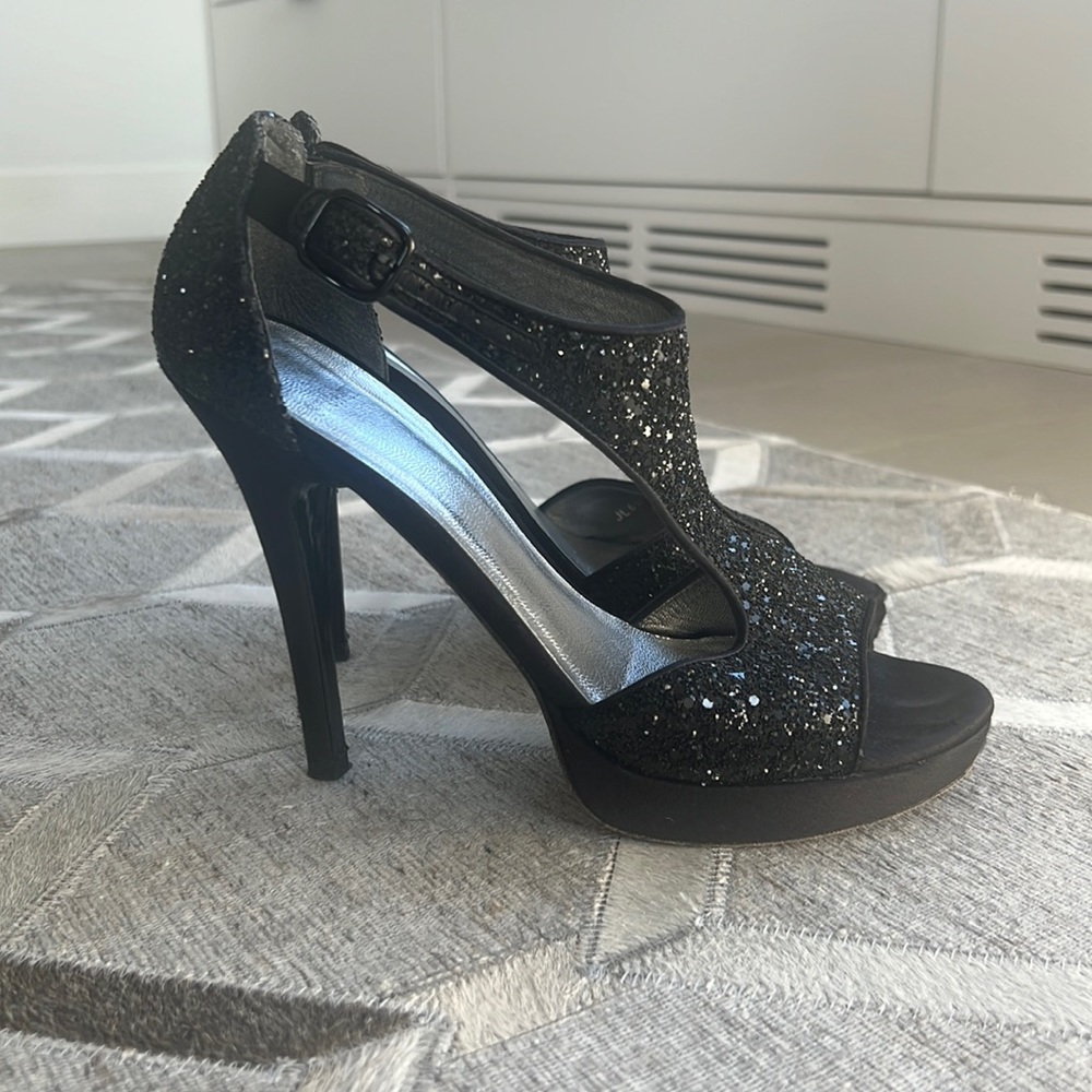 Stuart weitzman black sparkly heals about 4” size 8.5